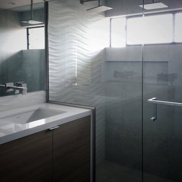 dimensional tile, waterfall vanity + rift oak at master bath