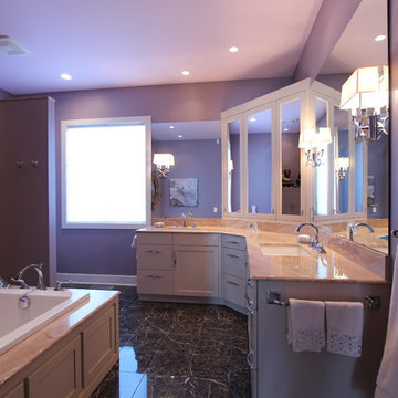 Double Vanity in L Shape with Marble Floors and Marble Countertops