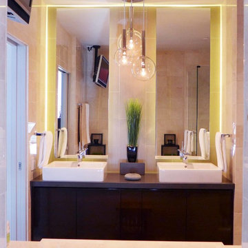 double vanity with a statement chandelier