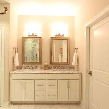 Double Vanity with Gold Mirrors and Polished Nickel Faucets