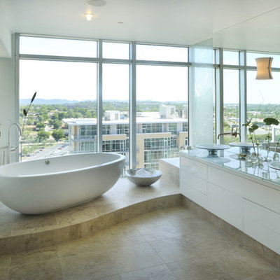 Example of a trendy freestanding bathtub design in Nashville with a vessel sink