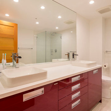 Downtown Vancouver Condo with Glossy Red Modern Bathroom