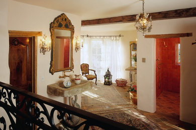 Example of an eclectic alcove shower design in San Luis Obispo with white walls