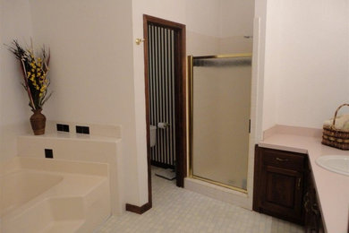 Small contemporary ensuite bathroom in Raleigh with an alcove shower, cement tiles, beige walls and ceramic flooring.