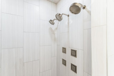 Inspiration for a medium sized traditional ensuite bathroom in Dallas with flat-panel cabinets, grey cabinets, a double shower, a one-piece toilet, white tiles, porcelain tiles, ceramic flooring, a submerged sink, engineered stone worktops, white floors, an open shower and white worktops.