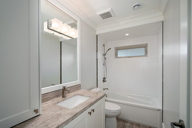 Bathroom - contemporary bathroom idea in Vancouver with shaker cabinets