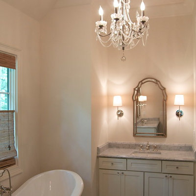 Example of a mid-sized classic master gray tile and stone tile marble floor bathroom design in Birmingham with an undermount sink, shaker cabinets, white cabinets, marble countertops, a two-piece toilet and white walls