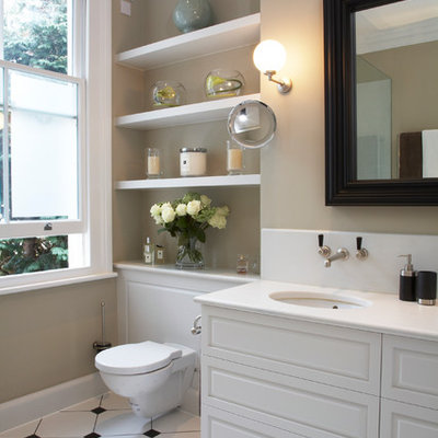 Mid-sized elegant bathroom photo in London with an undermount sink