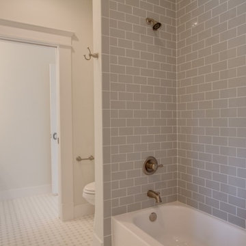 E. 13th Street Bathroom - Bath and Toilet View