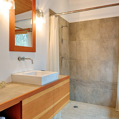 Inspiration for a small contemporary master gray tile and ceramic tile ceramic tile and gray floor bathroom remodel in Seattle with a vessel sink, flat-panel cabinets, light wood cabinets, white walls, tile countertops and gray countertops