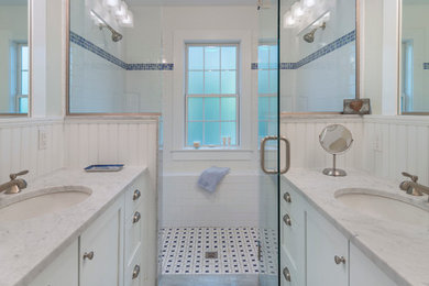 Large elegant master white tile and subway tile mosaic tile floor double shower photo in Providence with a drop-in sink, shaker cabinets, white cabinets, marble countertops and white walls
