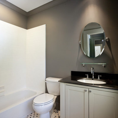 Inspiration for a timeless white tile bathroom remodel in Atlanta with an undermount sink, shaker cabinets, gray cabinets and a two-piece toilet
