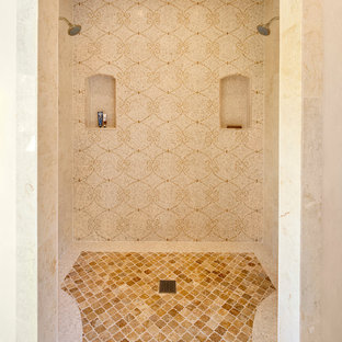 Tuscan beige tile alcove shower photo in Santa Barbara with beige walls