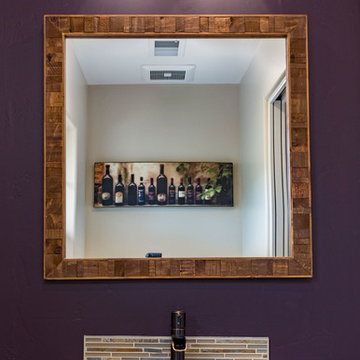 Eclectic Wine Barrel Sink and Wall Art in Purple Bathroom