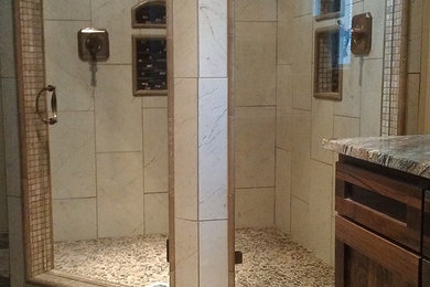 This is an example of a medium sized ensuite bathroom in Phoenix with shaker cabinets, dark wood cabinets, a corner shower, beige tiles, ceramic tiles, beige walls, ceramic flooring, a submerged sink, granite worktops, beige floors and a hinged door.