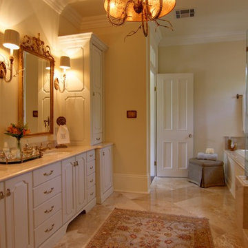 Elegant Master Bathroom with Custom Cabinetry & Lighting