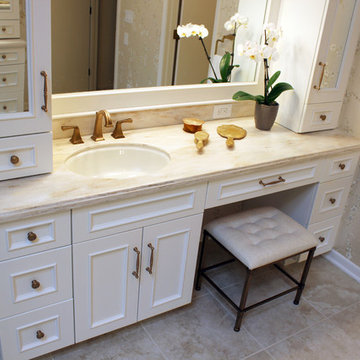Elegant White Bathroom with Beige Tiled Shower