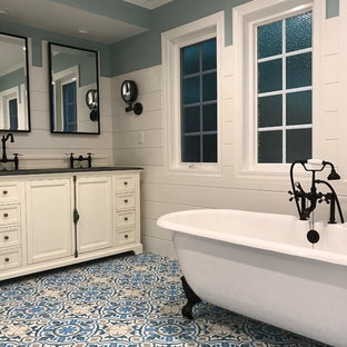 Drop-in bathtub - small contemporary black and white tile and ceramic tile ceramic tile and white floor drop-in bathtub idea in Other