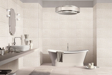 Example of a large trendy master white tile ceramic tile and white floor freestanding bathtub design in Las Vegas with white walls, a vessel sink and gray countertops