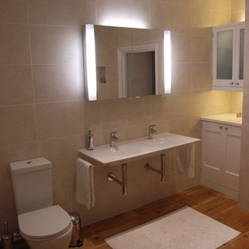 en-suite bathroom with twin hand basins