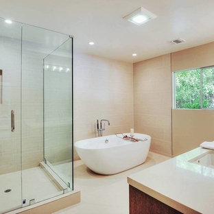 Trendy beige tile and wood-look tile bathroom photo in Los Angeles with an undermount sink, flat-panel cabinets, medium tone wood cabinets and quartz countertops