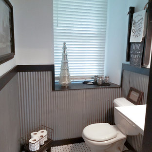 Small country 3/4 bathroom in Philadelphia with gray tile, metal tile, white walls, a pedestal sink and white floor.