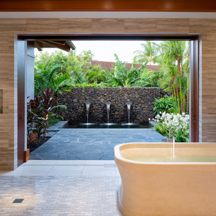 Bathroom - tropical master gray tile bathroom idea in Hawaii