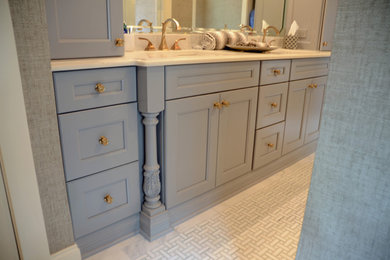 Inspiration for a timeless master bathroom remodel in Atlanta with recessed-panel cabinets and beige countertops
