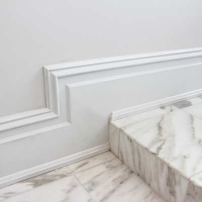 Large cottage chic master gray tile, multicolored tile, white tile and mosaic tile marble floor bathroom photo in New York with a drop-in sink, marble countertops, raised-panel cabinets, white cabinets, a two-piece toilet and white walls