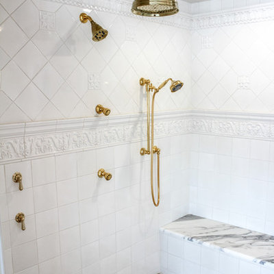 Large cottage chic master gray tile, multicolored tile, white tile and mosaic tile marble floor bathroom photo in New York with a drop-in sink, marble countertops, raised-panel cabinets, white cabinets, a two-piece toilet and white walls
