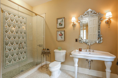Double shower - mediterranean beige tile and mosaic tile mosaic tile floor double shower idea in New York with a console sink, a two-piece toilet and beige walls