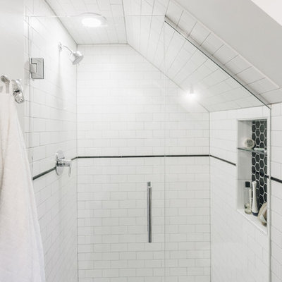 Alcove shower - small contemporary kids' black and white tile and porcelain tile porcelain tile alcove shower idea in Minneapolis with furniture-like cabinets, white cabinets, a two-piece toilet, gray walls and a wall-mount sink