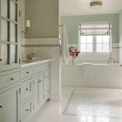 Example of a huge classic master white tile and mosaic tile marble floor bathroom design in Los Angeles with shaker cabinets, blue cabinets, an undermount tub, a wall-mount toilet, blue walls and marble countertops