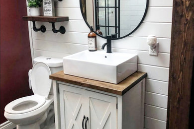 Example of a small farmhouse 3/4 white tile single-sink bathroom design in Vancouver with shaker cabinets, a vessel sink, wood countertops, brown countertops and a freestanding vanity