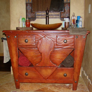 Faux finished vanity with onion dome appliqué and distressing