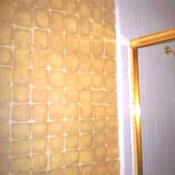 Faux painted tiles on bathroom wall