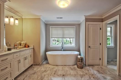 Bathroom - huge modern master gray tile and porcelain tile porcelain tile bathroom idea in New York with an undermount sink, flat-panel cabinets, white cabinets, marble countertops, a two-piece toilet and gray walls
