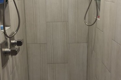 Small transitional 3/4 white tile and subway tile corner shower photo in Chicago