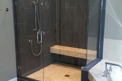 На фото: ванная комната с двойным душем и коричневой плиткой