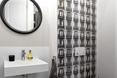 Bathroom - traditional black and white tile bathroom idea in Other with a wall-mount toilet