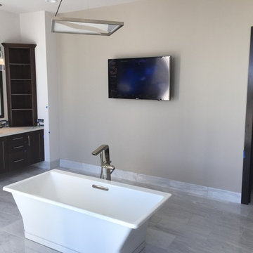 Flat screen TV in luxury master bathroom