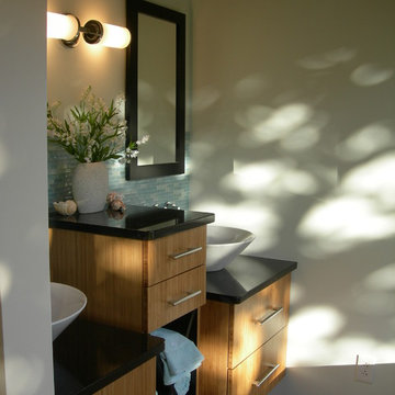 Floating cabinetry with vessel sinks