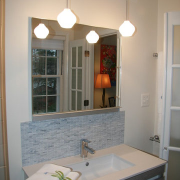 Floating sconces hung from ceiling save space and create beautiful, warm glow.