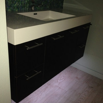 Floating vanity with LED under-cabinet lighting