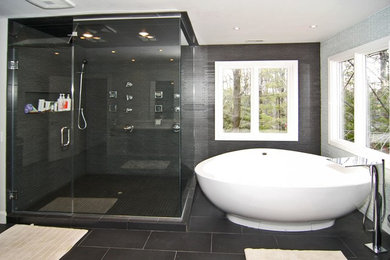 Example of a large classic master gray tile ceramic tile bathroom design in Indianapolis with a drop-in sink, dark wood cabinets, marble countertops, a one-piece toilet and gray walls