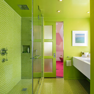 Example of a minimalist green tile bathroom design in San Francisco with white countertops