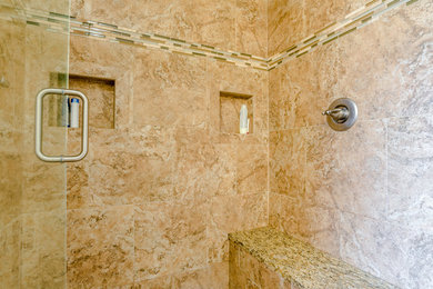 Mid-sized transitional master brown tile and porcelain tile porcelain tile double shower photo in Miami with shaker cabinets, light wood cabinets, a two-piece toilet, beige walls, an undermount sink and granite countertops