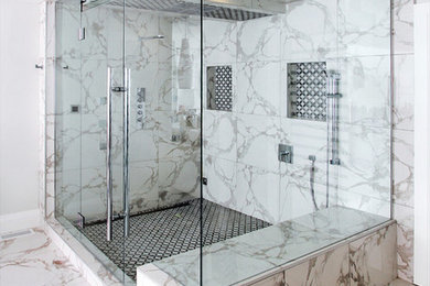 Example of a large master multicolored tile and stone slab marble floor corner shower design in Edmonton