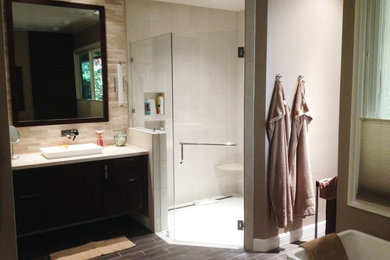 Example of a large trendy master corner shower design in Other