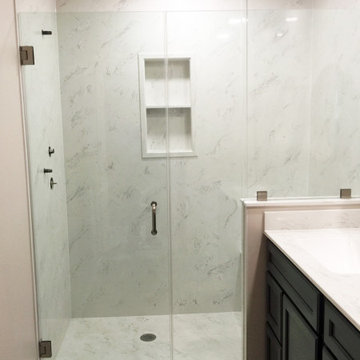Frameless Shower and Cultured Marble Walls